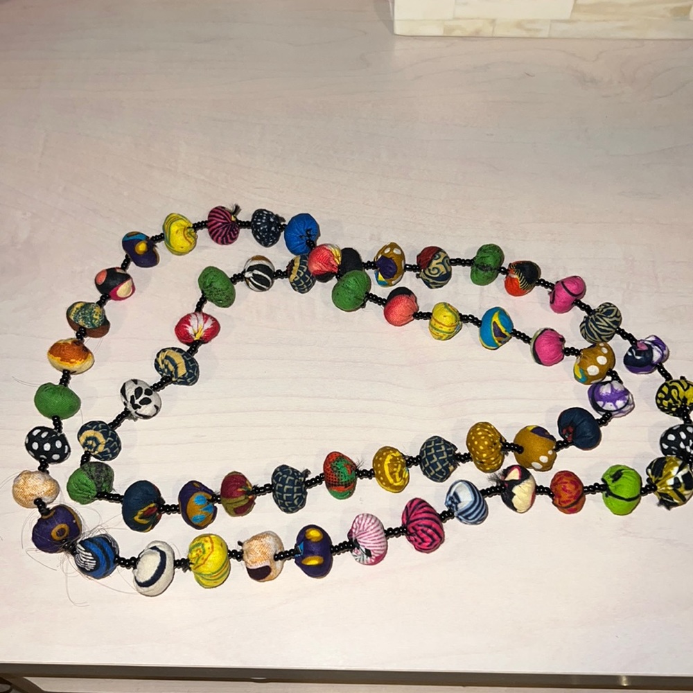 Long cloth beaded necklace